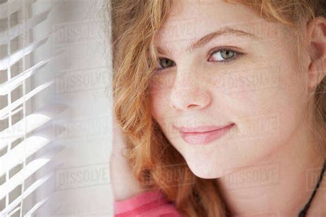 Portrait Of Girl By Window Stock Photo Dissolve