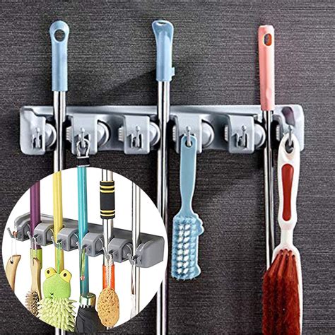 Receive free shipping on orders over $35! Juslilke Mop Broom Holder Wall Mount Sturdy Broom Holder ...