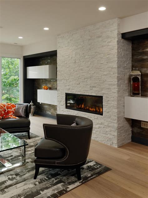 Contemporary family room design by other metros interior designer atmosphere interior design inc. Modern Living Room With White Brick Fireplace | HGTV