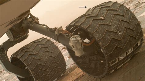 The mars rover vehicle navigator®, or mrvn®. Wheel damage suggests Mars rover approaching mid-life ...
