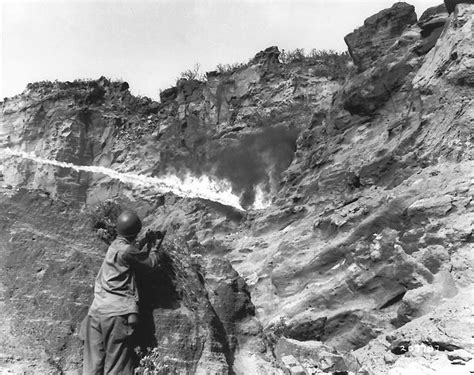 Photo Flame Thrower In Use Against Japanese Holding Out In A Cave