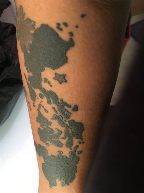 Forearm tattoo containing a script that speaks of some deep spiritual philosophy and creates an artful design. Traditional Filipino Tribal Tattoo Forearm