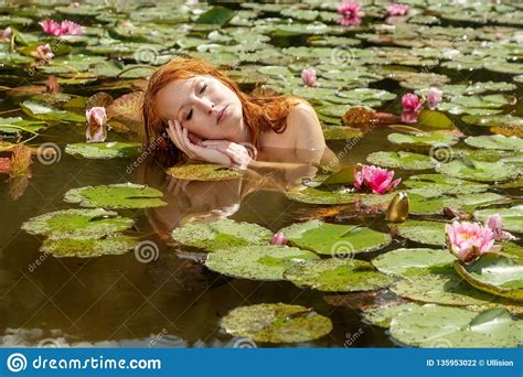 Beautiful Young Red Haired Mermaid Woman Sensually Seductively Delights