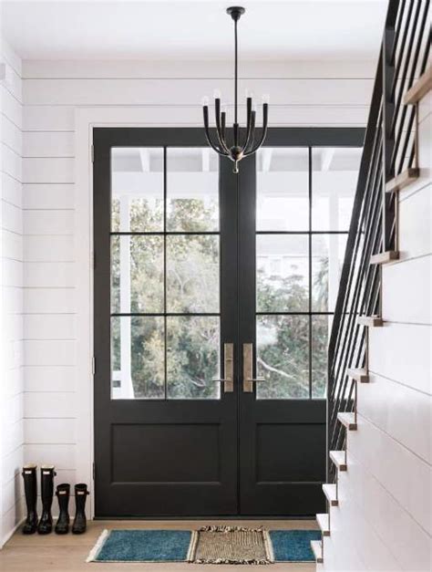 These doors are offering privacy for the pool, but it also connects. Farmhouse Door | Masterpiece Doors | Custom Composite Entry Doors
