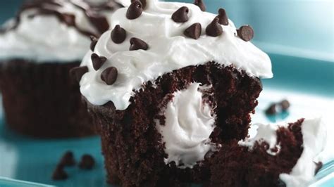 Chocolate chips to cream cheese mixture. Dreamy Cream-Filled Cupcakes recipe from Betty Crocker