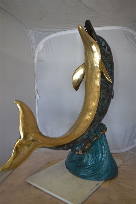 Single Dolphin On Wave Fountain Bronze Statue Size 48″l X 24″w X 53
