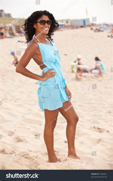 Beautiful Brazilian Girl Standing On The Beach Stock Photo