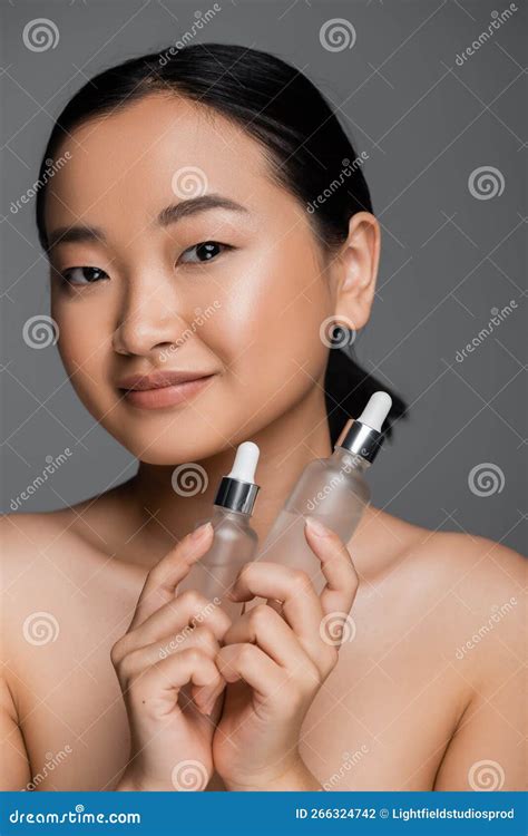 Pleased Asian Woman With Naked Shoulders Stock Photo Image Of Clean