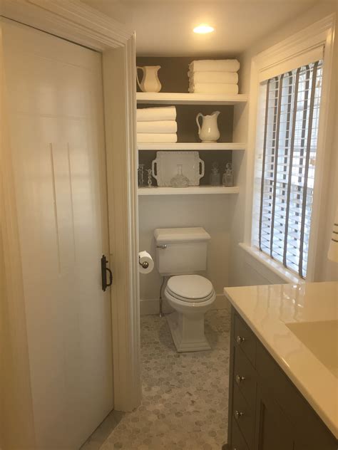 The elusive is now within reach. Gray and white bathroom, marble carrera hexagon tile floor ...