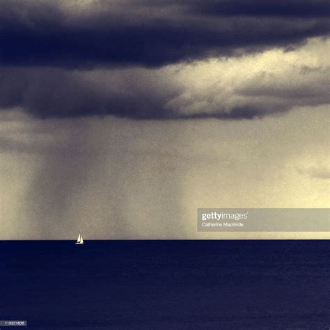 Small Sail Boat In Stormy Weather High Res Stock Photo Getty Images