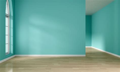 Green Wall In An Empty Room With A Wooden Floor Free Photo