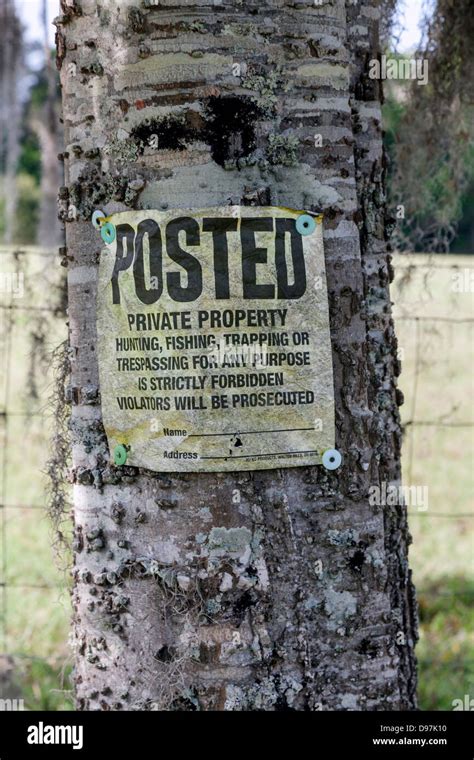 Posted Private Property Sign Nailed To A Tree Stock Photo Alamy