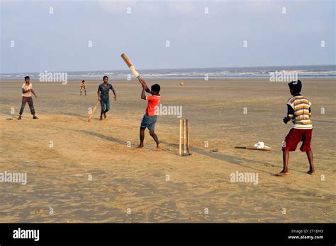 Boys Playing Cricket On The Beach Of Mandarmoni Kolkata West Bengal
