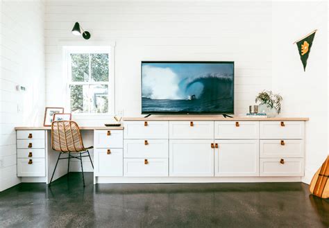 This is a famous solution amongst djs because you can store a lot of vinyls in its spaces. Custom Desk and Media Center Using Ikea Sektion and ...