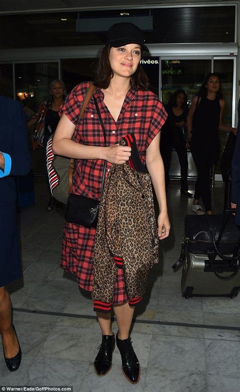Marion cotillard before the dior fashion show. Make-up free Marion Cotillard touches down for Cannes ...