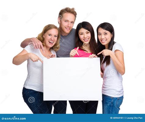 Group Of People With Diverse Ethnicities Holding Blank Sign For Stock