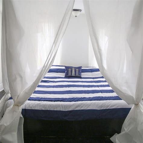 A perfect way to add some patterns to your. How to Hang a Canopy from the Ceiling Without Drilling ...