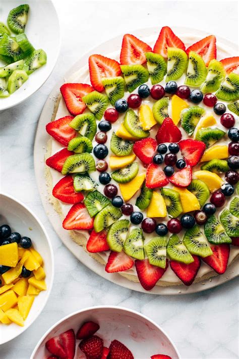 The sweetness from the fruit combined with the zesty dressing and crunchy. Fruit Pizza Recipe - Pinch of Yum