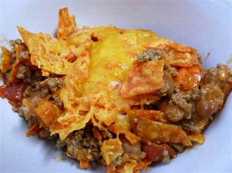 This is a cheesy casserole has the crunch of doritos and the spice of rotel tomatoes. Cookin' Cowgirl: Mexican Dorito Casserole