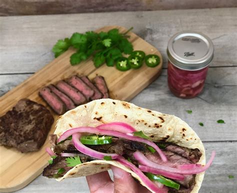 Skirt Steak Tacos With Pickled Onions