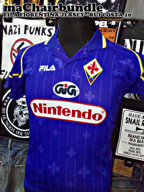 Fiorentina have had numerous kit manufacturers over the years, regularly chasing kit partner. maChairbundle: Fila Fiorentina Jersey 'Rui Costa 10 ...