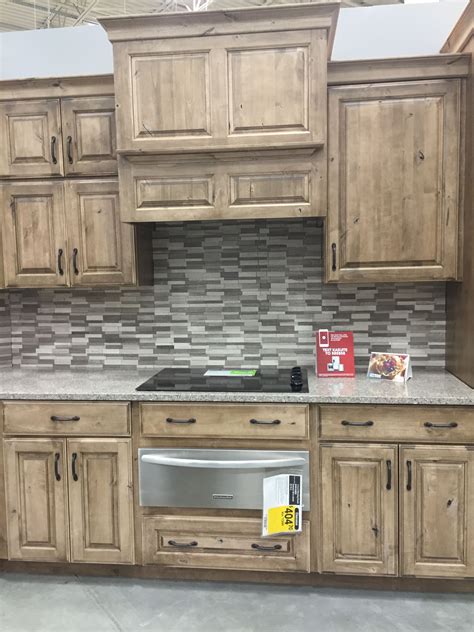 The traditional farmhouse cabinets surround an oversized kitchen island shop cabinet hardware and a variety of hardware products online at lowes.com. Lowes Cabinet Doors 2020 in 2020 | Rustic kitchen cabinets ...