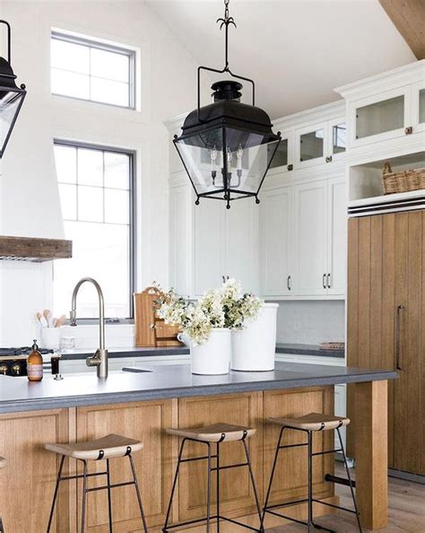 Small southwest galley brick floor and wood ceiling kitchen photo in phoenix with an undermount sink, shaker cabinets, dark wood cabinets, quartz countertops, multicolored backsplash, cement tile backsplash, stainless steel appliances, an island and beige countertops 60 Great Farmhouse Kitchen Countertops Design Ideas And Decor (13) - Googodecor