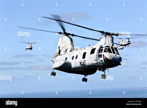 Military Helicopters Fly In Formation Hi Res Stock Photography And