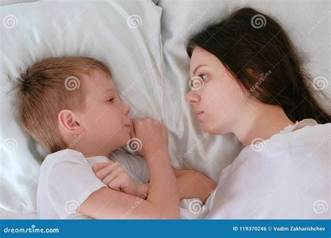 Mom And Son Wake Up And Look At Each Other Stock Photo Image Of Home Care