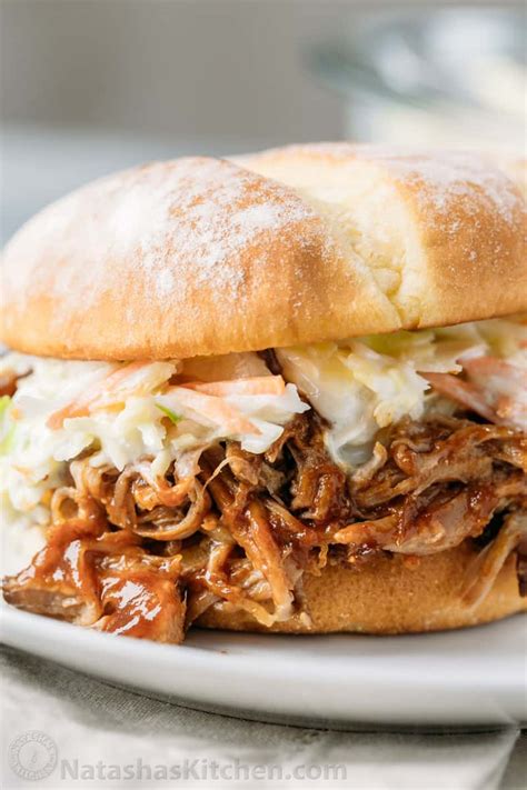 This healthy pulled pork is moist, low fat and a delicious healthy filling for fresh rolls. Pulled Pork Recipe (VIDEO) - NatashasKitchen.com