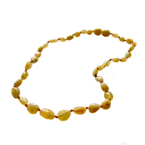 L'ambre et plus spécialement le collier d'ambre est reconnu par des générations de parents, pour apaiser les bébés. Collier d'ambre bébé, olive ambre blanc - Bijoux d'Ambre