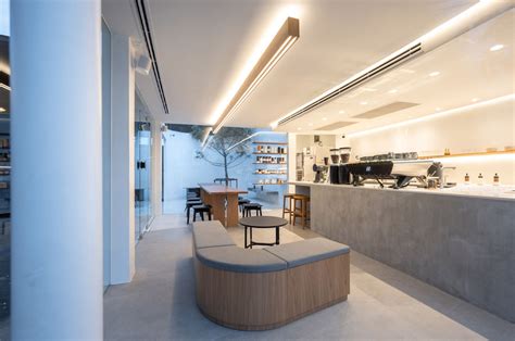 Minimal Cafe With Glass Panels Floating Corners Is A Tranquil Haven