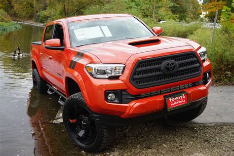Before you try and reset your connection to apple carplay®, you might be wondering why it's not working in the first place. 2017 Toyota Tacoma Custom Toyota of Naperville beauty shot | Toyota of Naperville