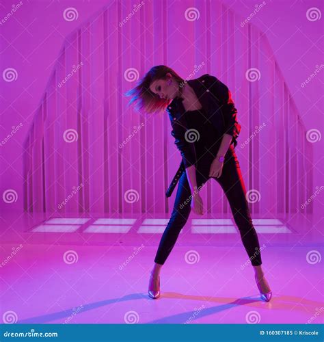 Beautiful Girl Dancing In Retro Wave On The Neon Light Stock Image Image Of Colorful Retro