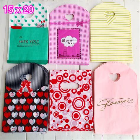 Paquete de 100 bolsa polipapel 14 x 19 Surtida – Joi Boutique