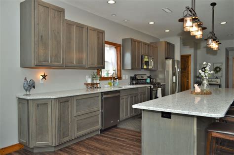 Have designs ready to email for layout advice. Bailey's Cabinets, Haas Signature Collection, Rustic Hickory, Barnwood finish, Dresden door style