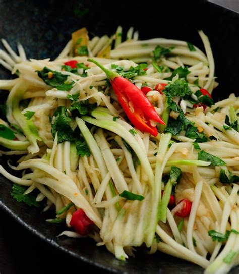 Drop that menu and discover how easy it is to make healthier versions of these classic dishes right at home. Authentic Green Mango Salad - Easy Thai Recipes | Asian ...