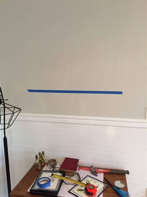 Next, hang the top item followed by the frame on the left. Two Easy Picture Hanging Hacks; how to hang pictures in a ...