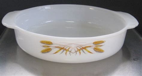 One of the most feminine patterns available in the fire king line of products, the primrose pattern depicts a romantic bundle of vibrant red and pink flowers that act as a stark contrast to the white surface they usually adorn. Vintage Fire-King Wheat Pattern 8" Baking and 11 similar items