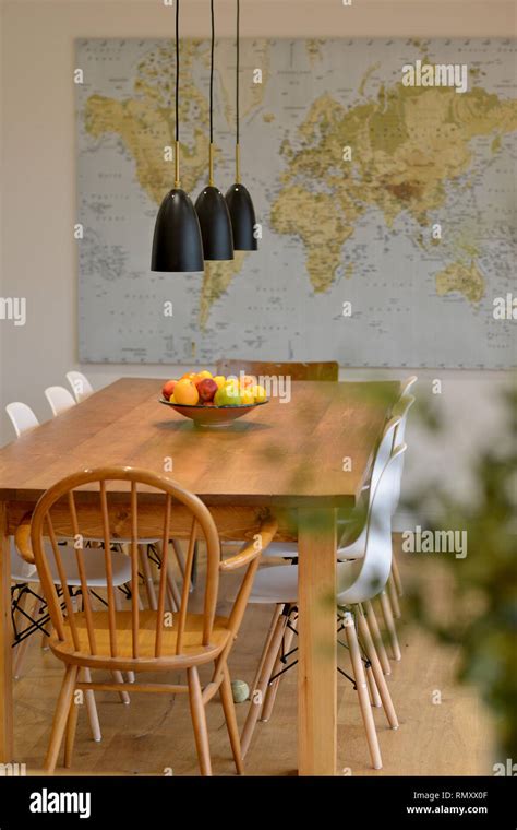 Dining Room Table With Wall Map Stock Photo Alamy