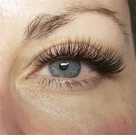 hybrid eyelash extensions a combination of individual and russian volume lashes russian