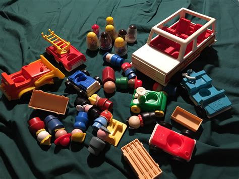 Around the neighborhood vehicle pack. Vintage little people and weebles, same garage sale as the ...