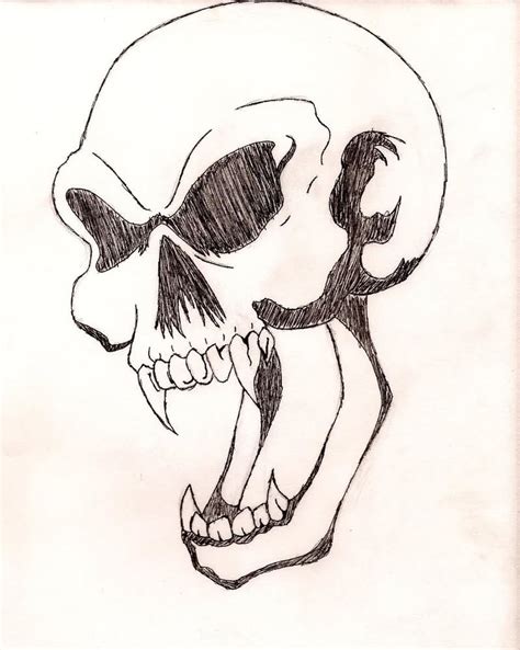 25 Vampire Skull Tattoo Designs