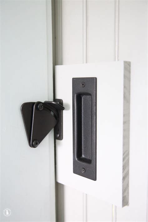 This excellent video takes you step by step through the process. how to get privacy, and add a lock to your barn door ...