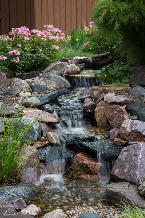 Shopping at your local garden center can give you some ideas, but keep in mind that backyard waterfall ponds can also be made with unique items from your local antique mall, garage sale or flea market. Pondless Waterfall Design & Construction Tips for Beginners