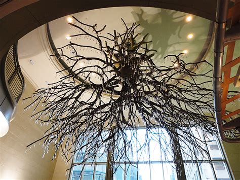 There are two chandelier trees. Sirshasana Chandelier | Art Nerd New York