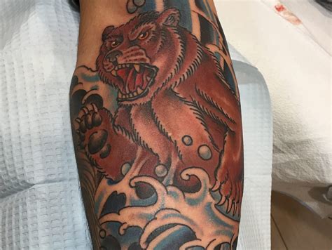 Maybe you would like to learn more about one of these? Traditional American Bear and Waves on Arm Tattoo - Joe Haasch Tattoo