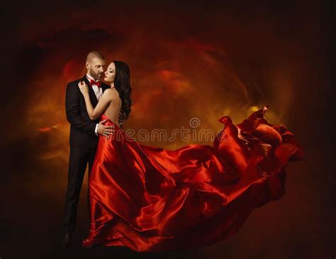 Elegant Couple Dancing In Love Woman In Red Clothes And Lover Man In