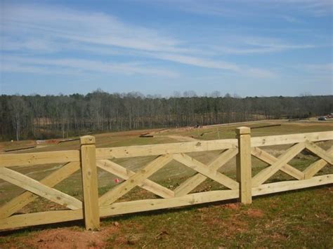 Castle, in conjunction with field outdoor spaces, designed and built a large deck area in the back yard of the home, which includes a detached screen porch and a bar & grill area under a cedar pergola. ideas for planting in front of a split rail fence | Found ...