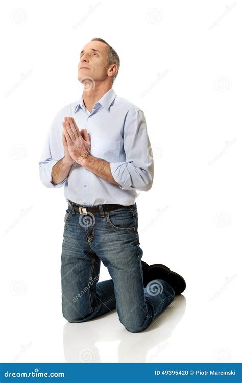 Man Kneeling And Praying To God Stock Photo Image Of Fingers